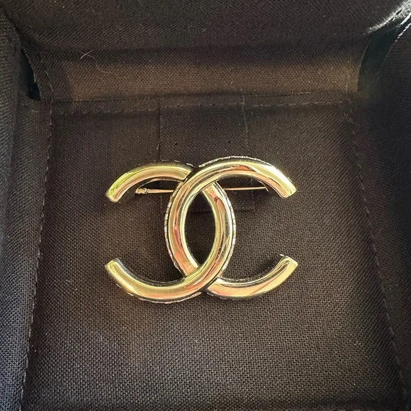 Chanel Silver Crystal Logo Brooch